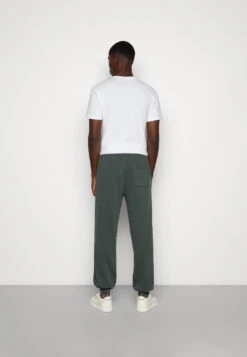 YOURTURN Oversized Unisex - Pantalones Deportivos -Dark Green -Moda Tienda 42776076c49c4d49984fa3254d41719b